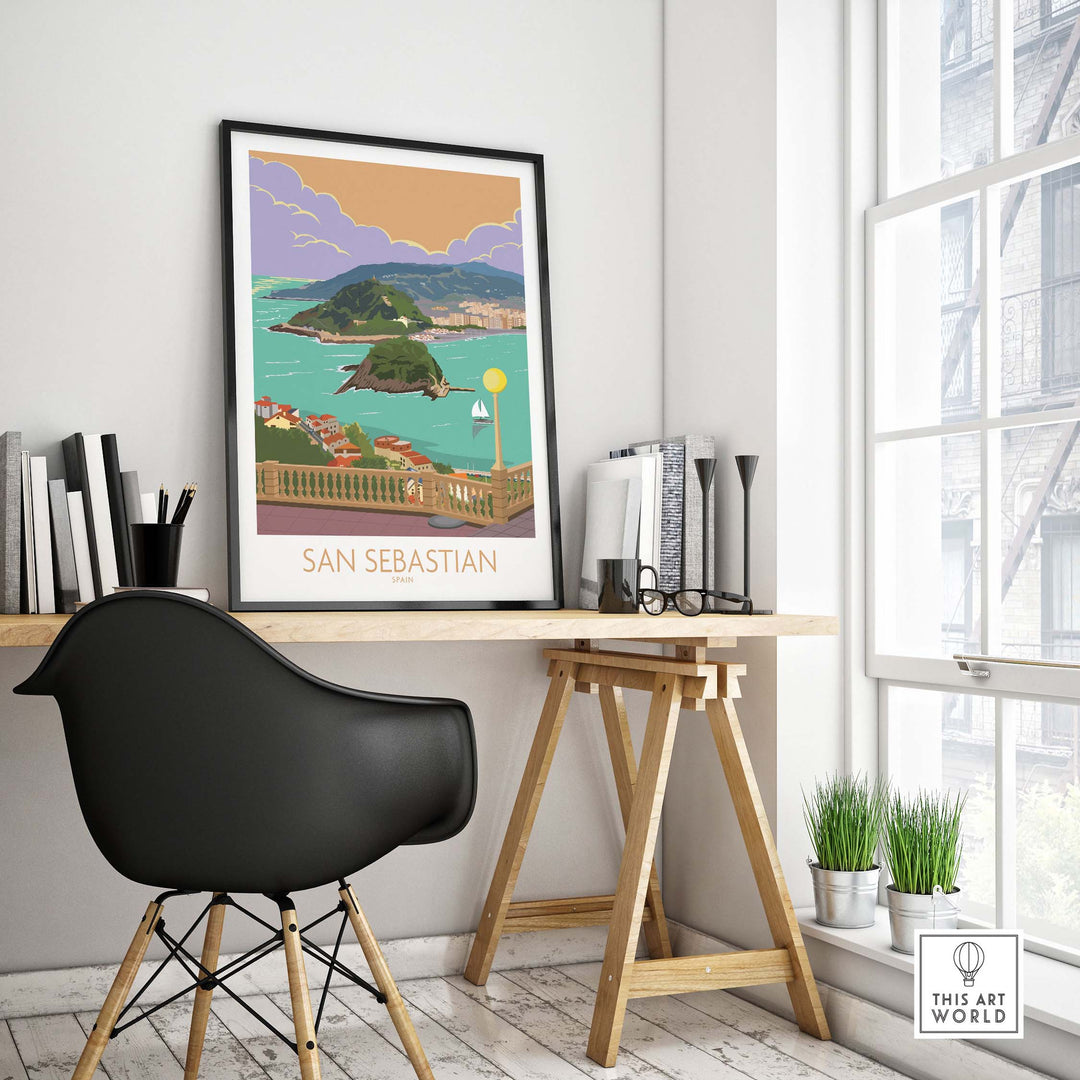 San Sebastian Poster Print on a wall above a stylish desk, showcasing vibrant travel art in a modern office setting.