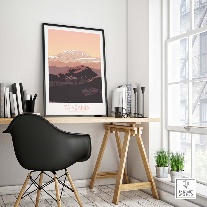Kilimanjaro Print Tanzania Poster displayed in a stylish modern office setting with a black chair and large window.