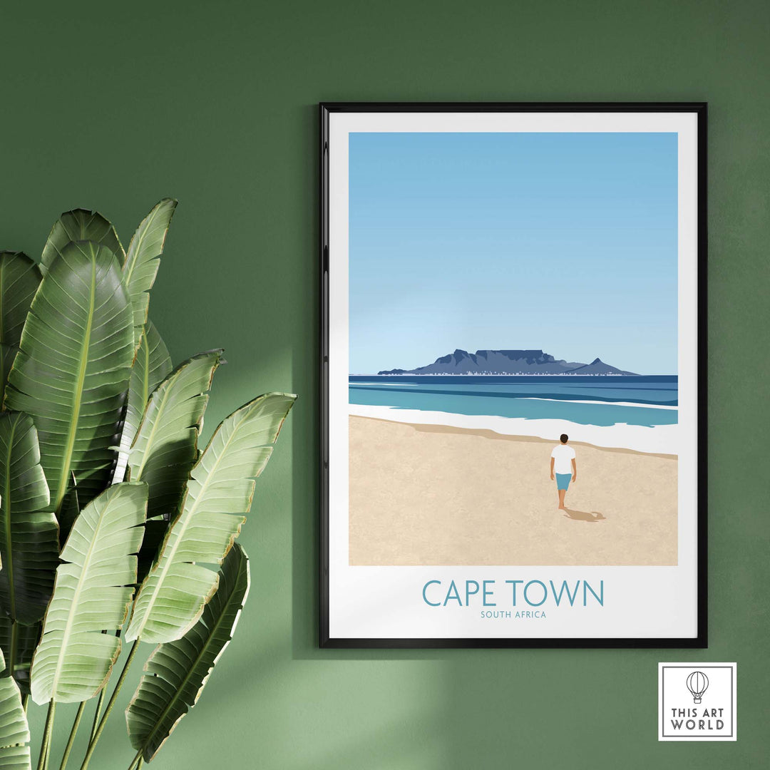 Cape Town wall art print featuring a beach scene and Table Mountain, framed against a green wall.