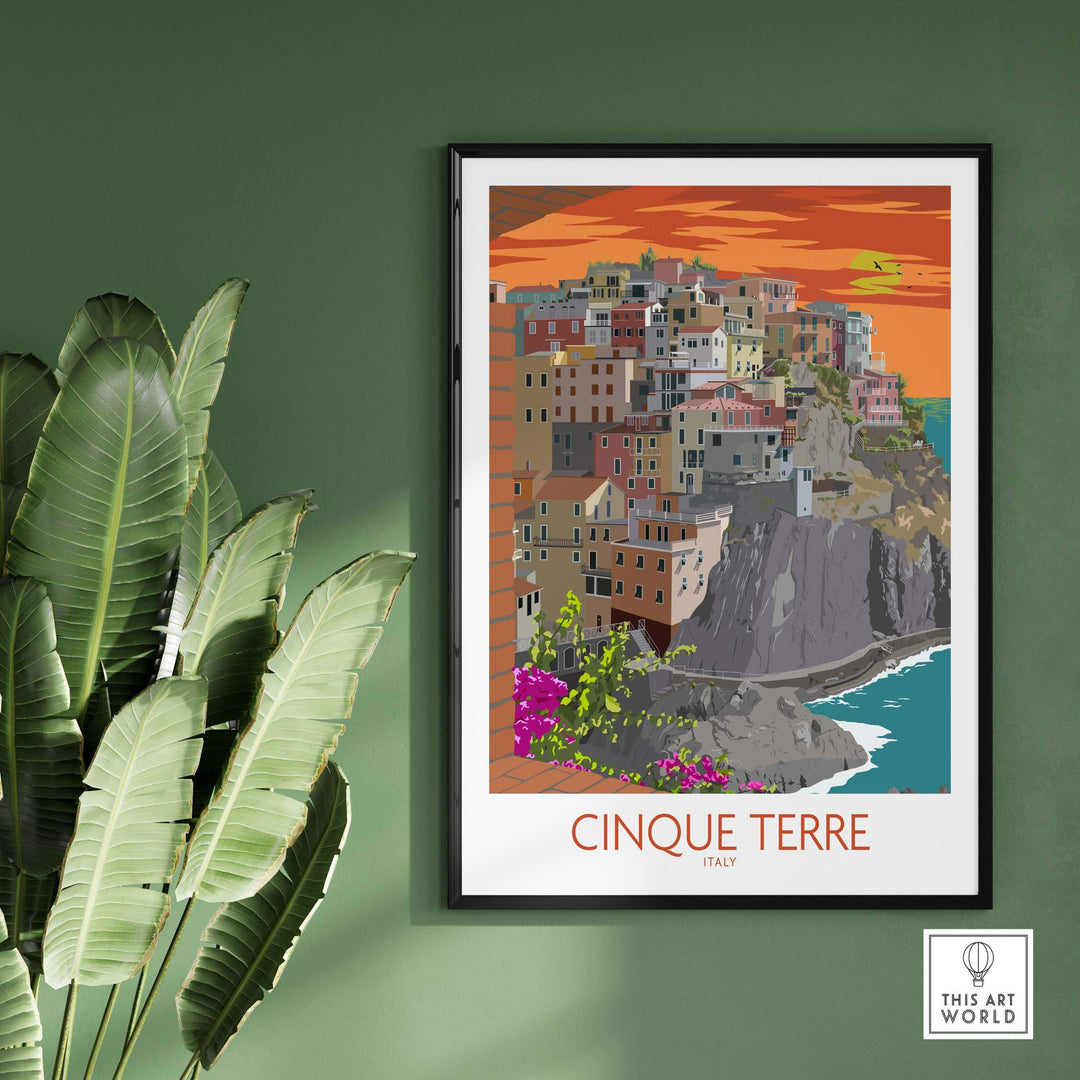 Vintage Cinque Terre print on a green wall, featuring colorful coastal houses and ocean views, perfect for travel art lovers.
