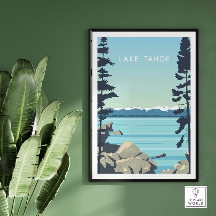 Lake Tahoe Print Wall Art Poster with vintage design, framed, against green wall and tropical leaves.