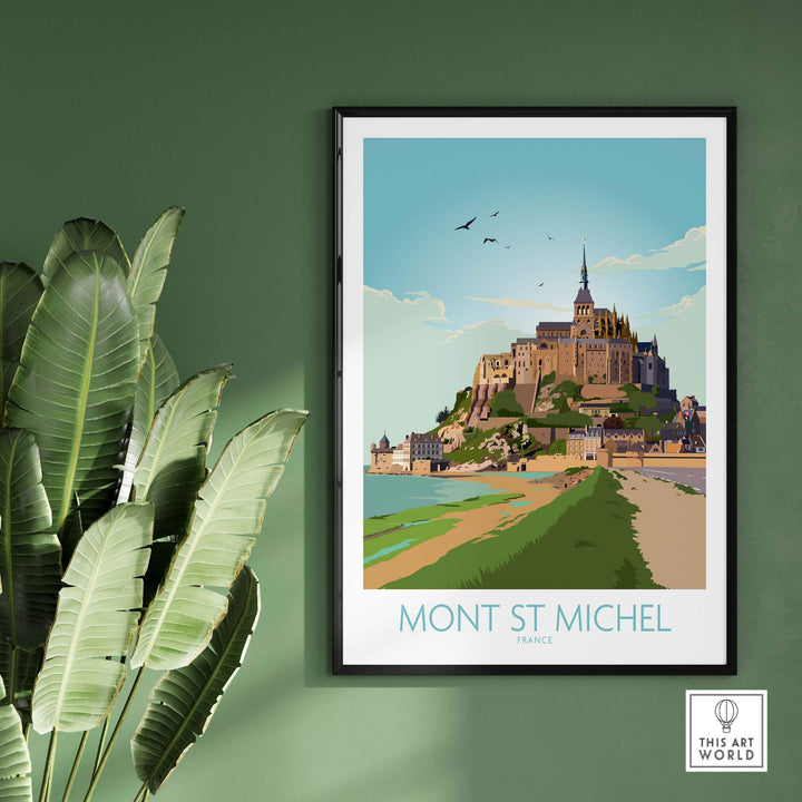 Mont Saint Michel vintage travel art print framed on green wall with tropical plant, inspiring wanderlust.