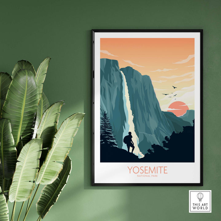 Yosemite National Park art print featuring a waterfall and hiker, framed on a green wall, embodying nature's beauty.