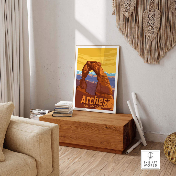 Arches National Park vintage poster displayed on a wooden table in a cozy living room setting.