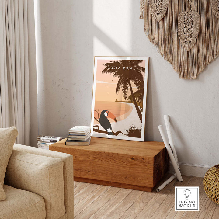 Costa Rica Print Wall Art Poster displayed in a stylish home setting on a wooden table with cozy decor elements.