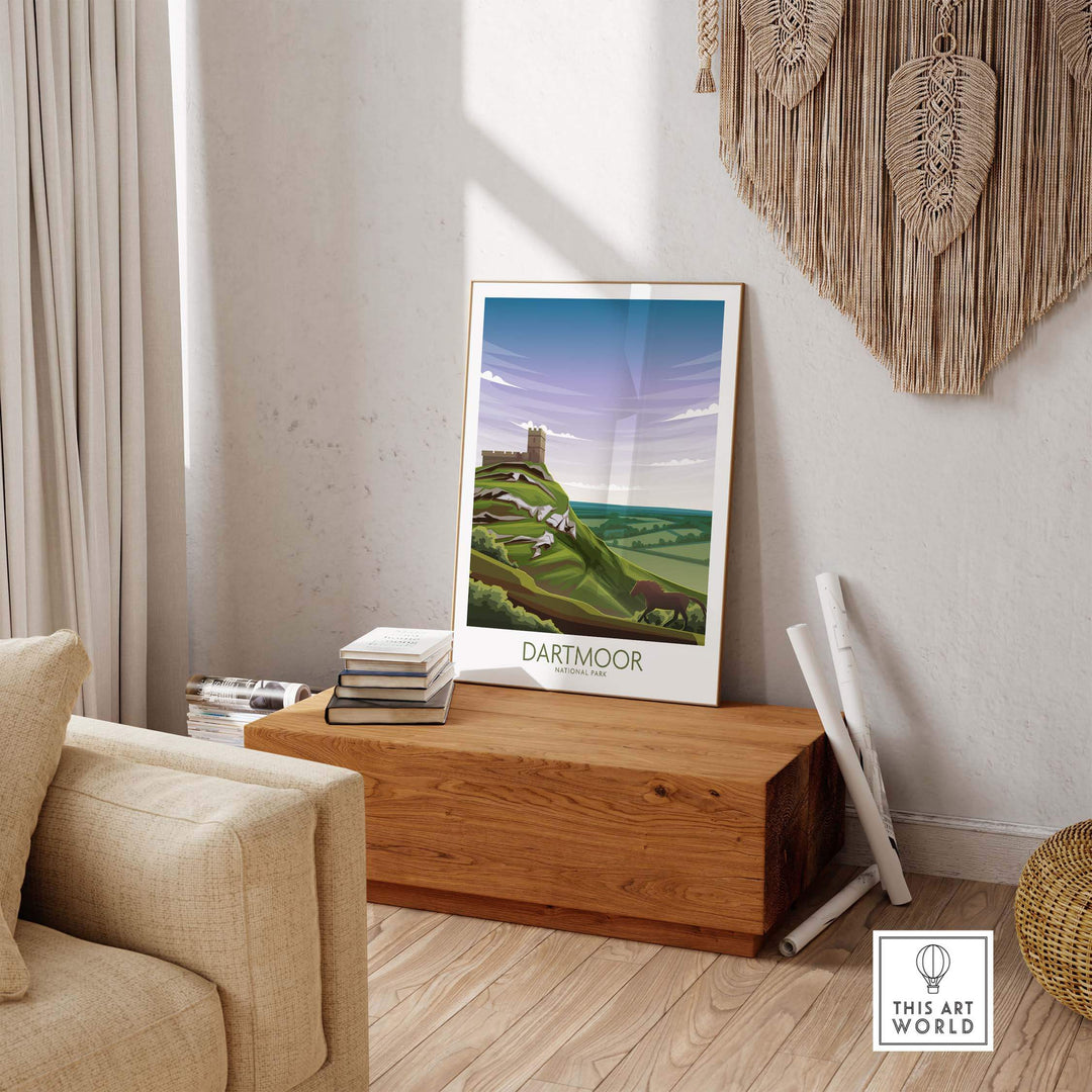 Dartmoor National Park poster art print displayed in a stylish living room on a wooden table.