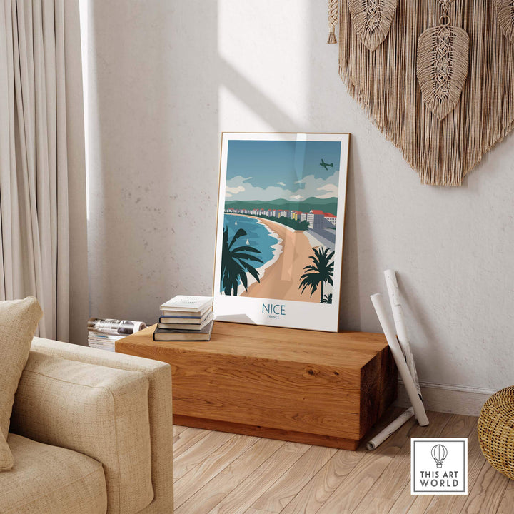 Nice France travel poster displayed in a stylish living room, featuring a beach and palm trees.