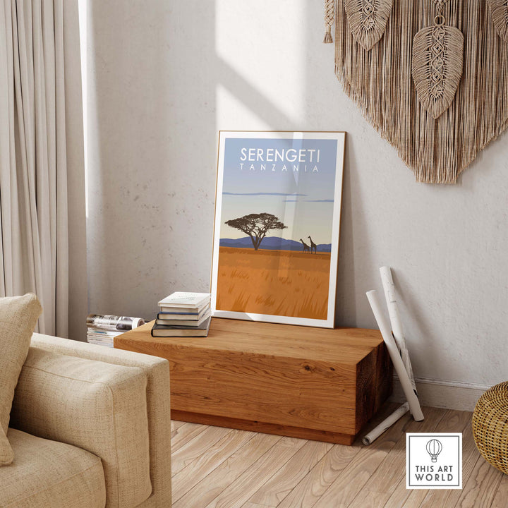 Serengeti Print Tanzania Travel Poster displayed in a stylish living room with wooden accents.