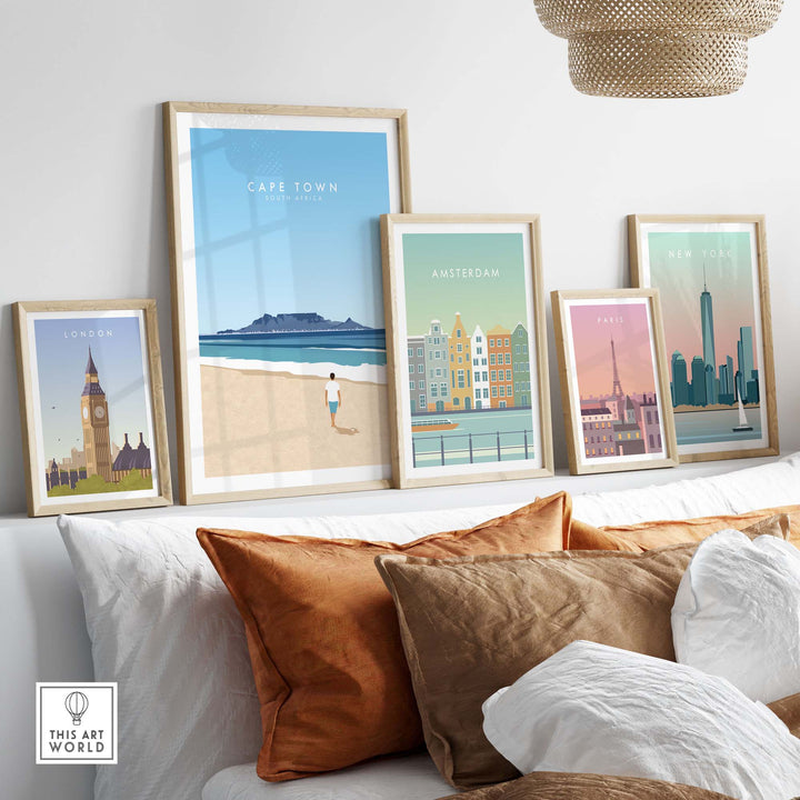 Cape Town print and other city artwork displayed in minimalist frames on a stylish sofa, enhancing home decor.