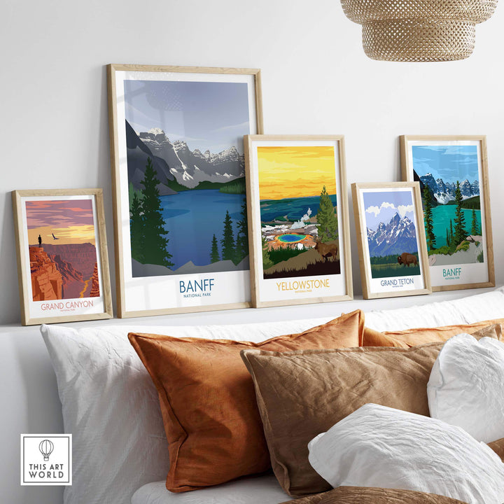 Collection of framed national park art prints including Banff, displayed on a stylish couch.