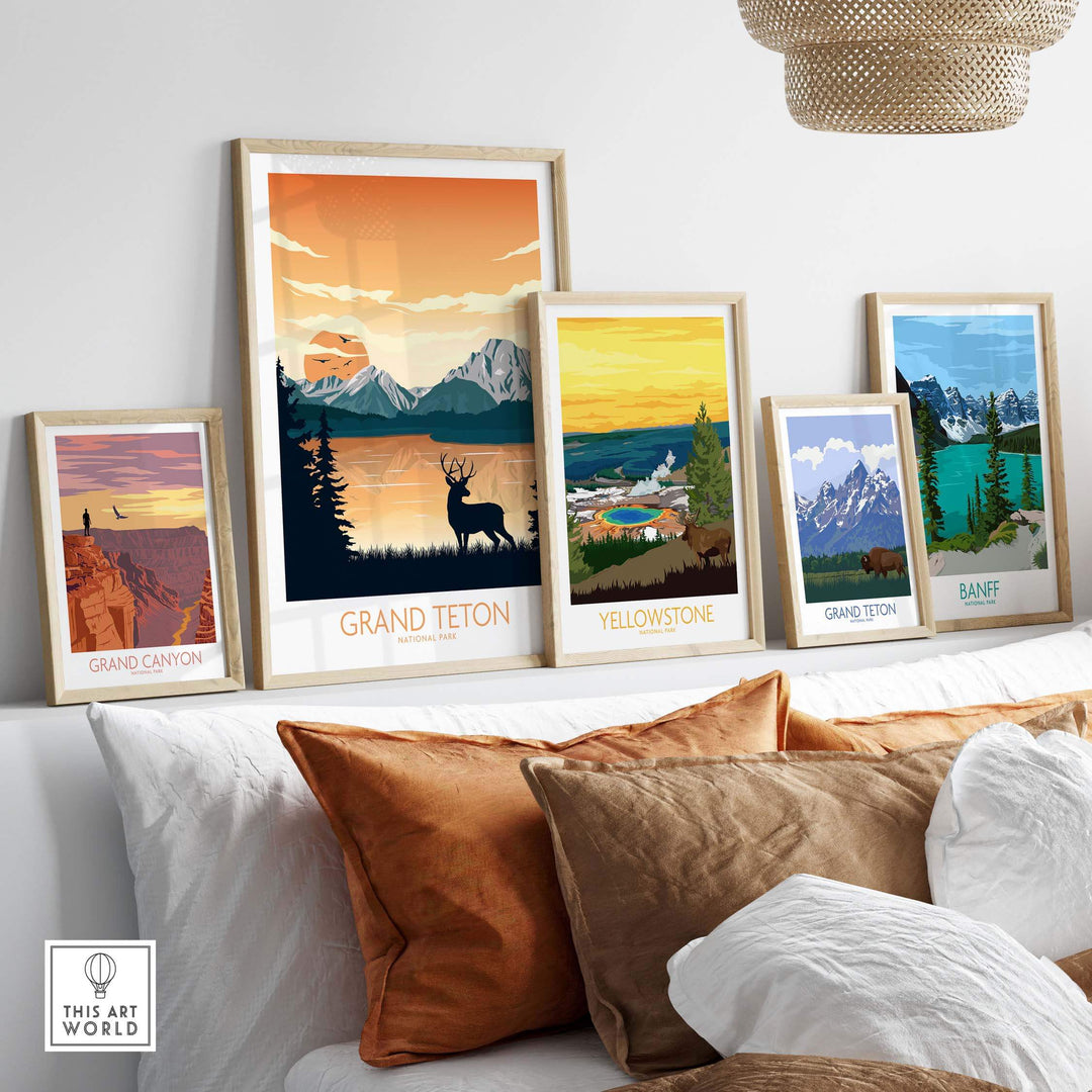 Grand Canyon and National Park poster prints displayed on a couch, showcasing vintage-inspired outdoor artwork.