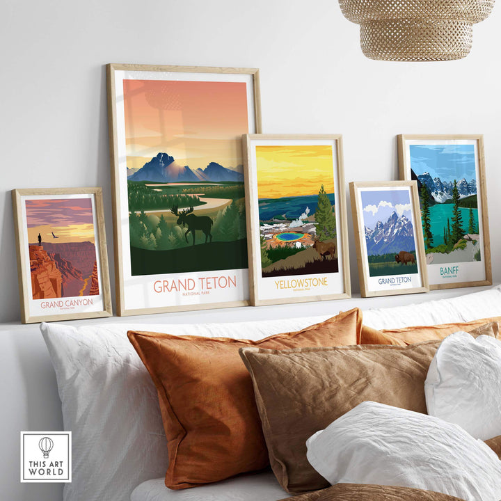 Framed Grand Teton National Park art prints displayed on a wall above cozy pillows, showcasing nature inspiration.