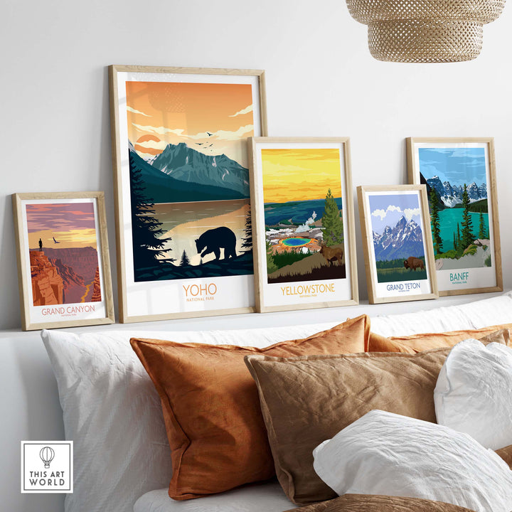 Colorful framed national park posters including Yoho, Grand Canyon, Yellowstone, and Banff displayed in a cozy living room.