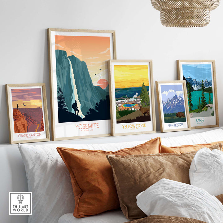 Framed art prints of national parks including Yosemite, Grand Canyon, and Banff displayed in a stylish interior setting.