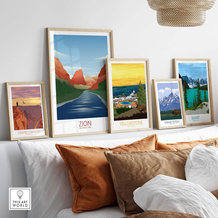 Gallery of framed National Park art prints, featuring Zion, Yellowstone, and others, displayed on a stylish couch.