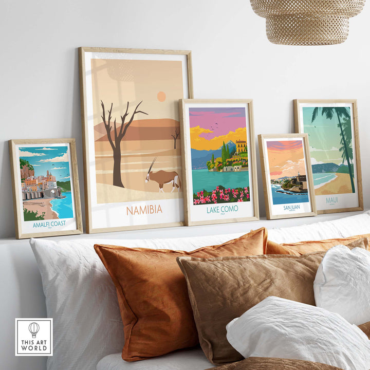 Namibia travel poster print displayed among vintage-style wall art in a stylish home setting.