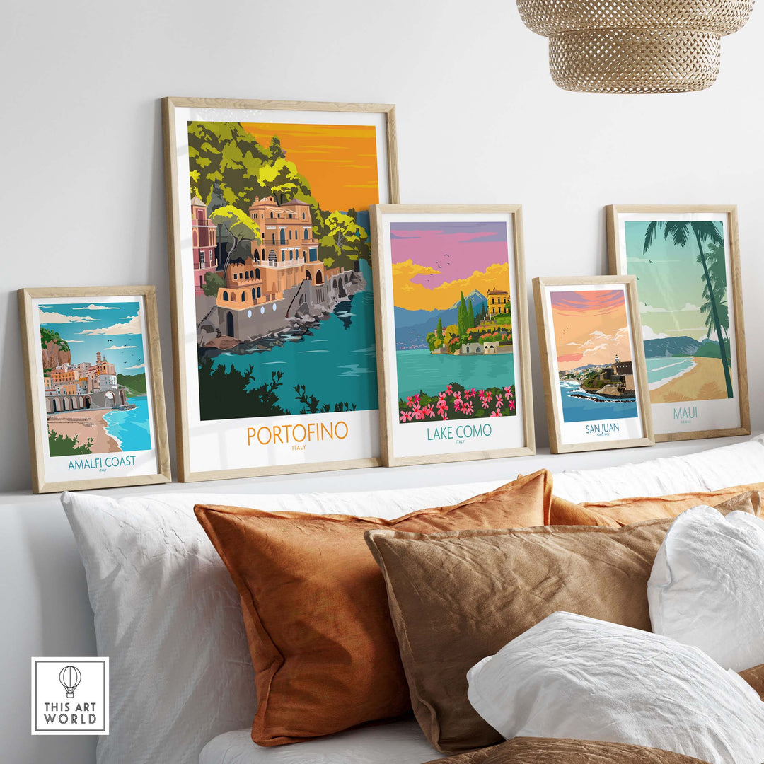 Framed Portofino and other vintage travel posters on a stylish shelf, showcasing wanderlust decor.