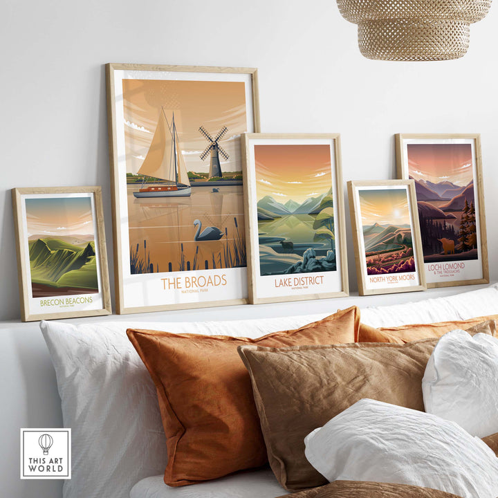 The Broads National Park art print among framed landscape posters in a cozy living room setting.