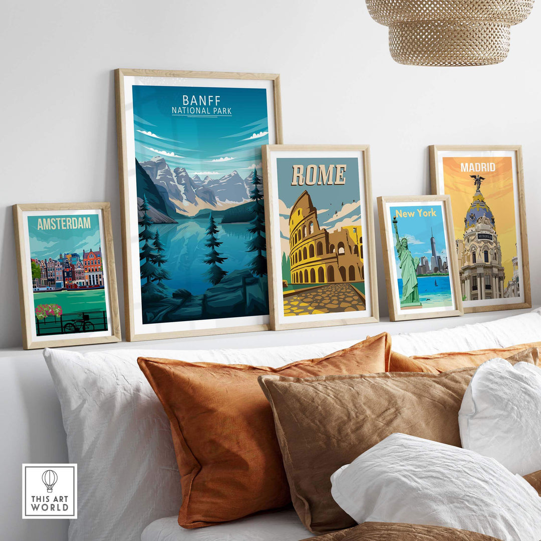 Framed travel art prints including Banff National Park, Rome, Amsterdam, New York, and Madrid displayed in a stylish room.