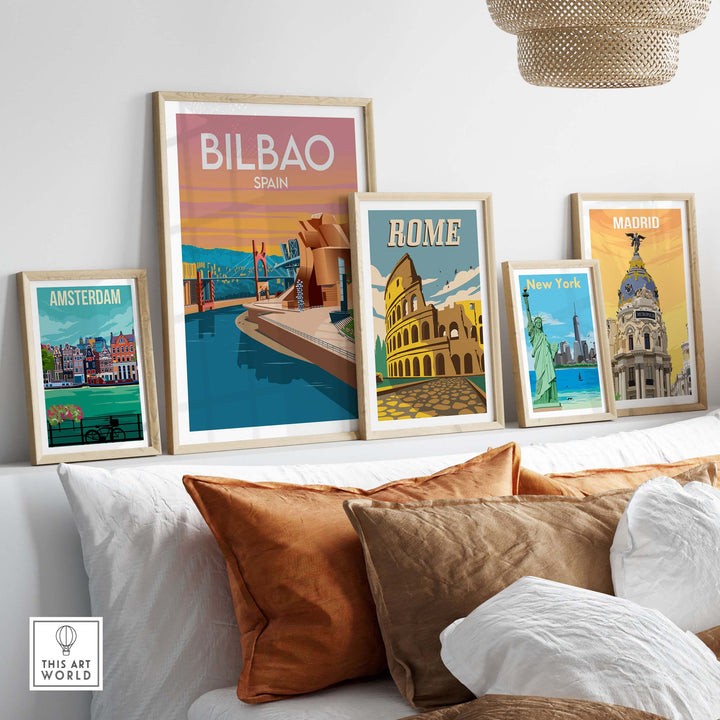Framed Bilbao Spain Art Print alongside vintage travel posters of Amsterdam, Rome, and Madrid in a stylish home setting.