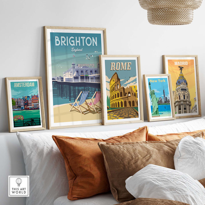 Brighton wall art print among other city prints on a cozy sofa, showcasing iconic travel destinations.