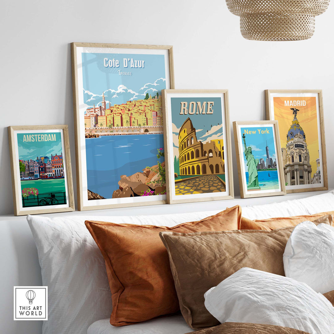 Cote d'Azur, Amsterdam, Rome, New York, and Madrid vintage travel posters displayed on a stylish couch.