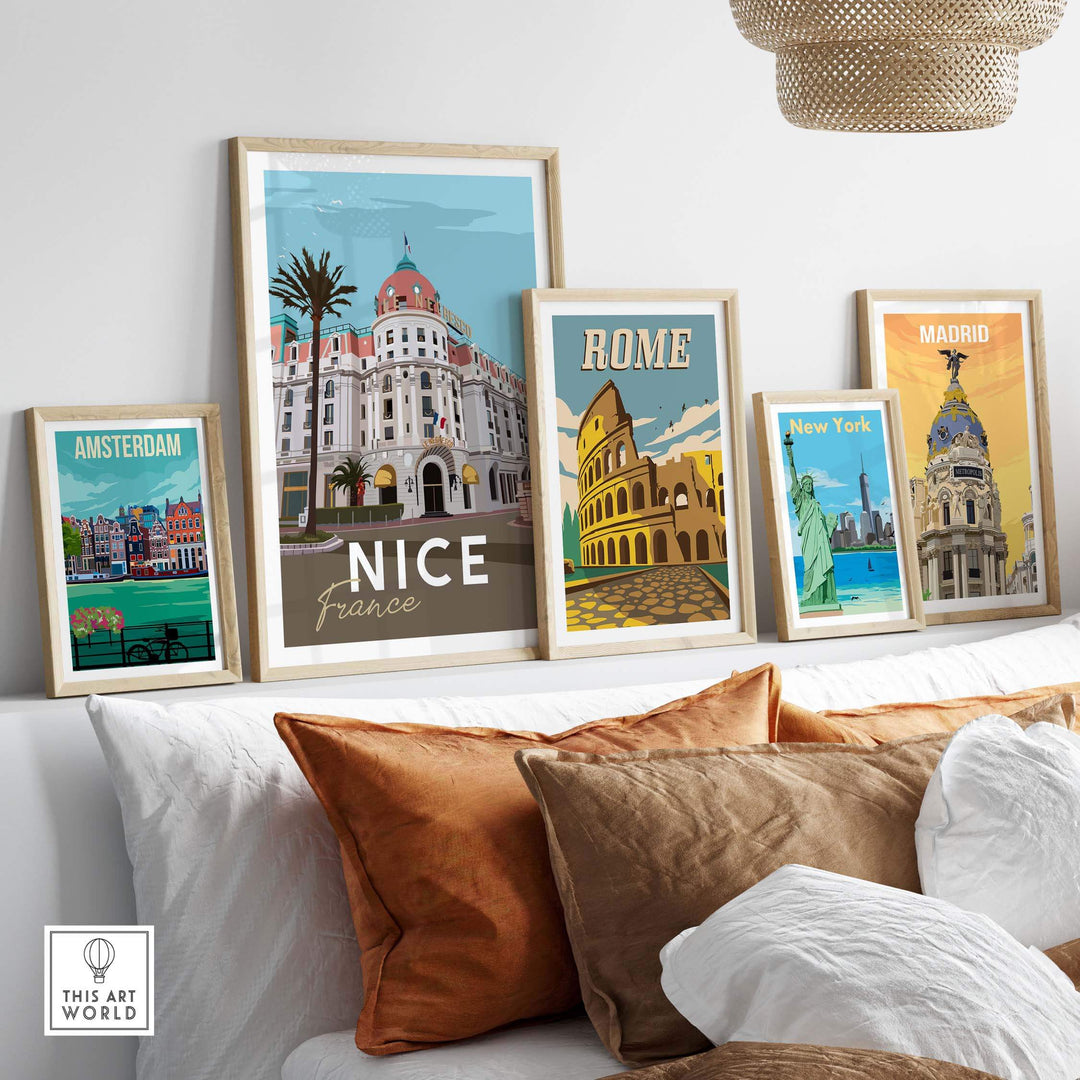 Framed travel posters including Nice France, Rome, New York, Amsterdam, and Madrid art prints displayed on a stylish sofa.