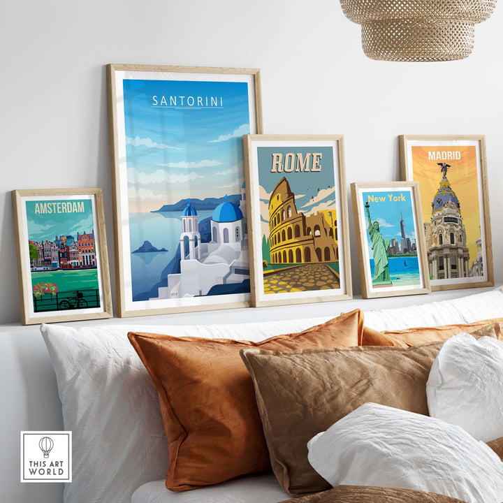Framed Santorini print wall art alongside Amsterdam, Rome, and Madrid prints in a stylish interior setting.