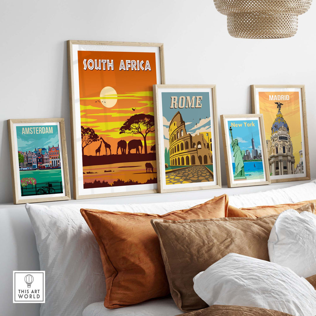 Framed travel posters featuring South Africa, Amsterdam, Rome, New York, and Madrid displayed in a stylish living room.