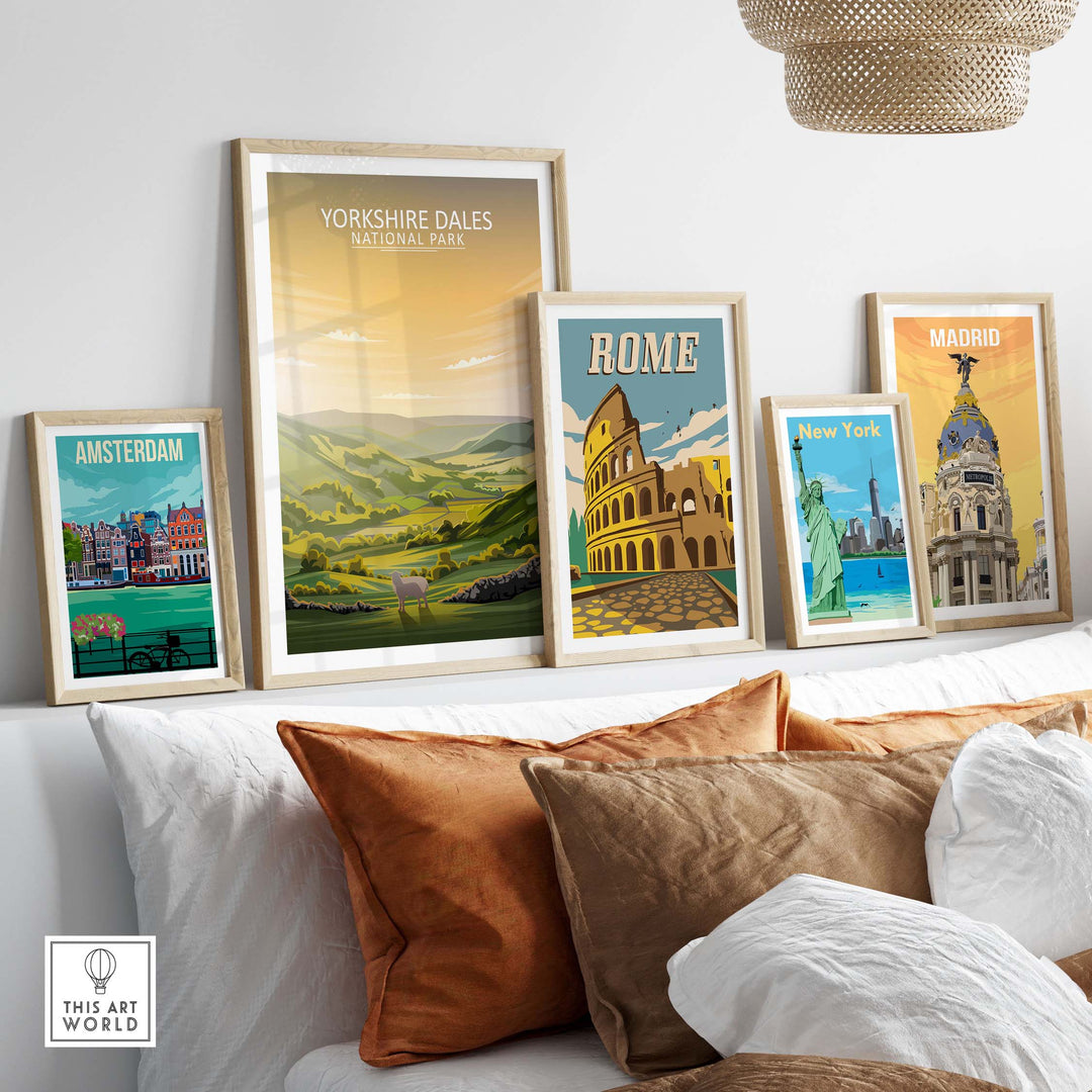 Framed Yorkshire Dales National Park poster among other city prints on a stylish couch.