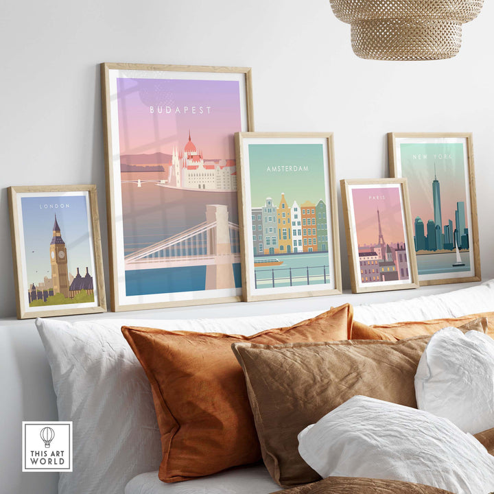 Stylish Budapest print wall art in frames, showcasing travel nostalgia with other city posters on a cozy couch.
