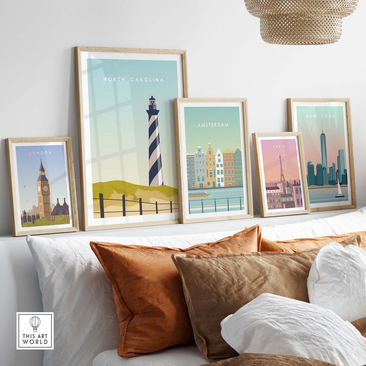 North Carolina travel poster print displayed with other city art prints in a stylish living room setting.