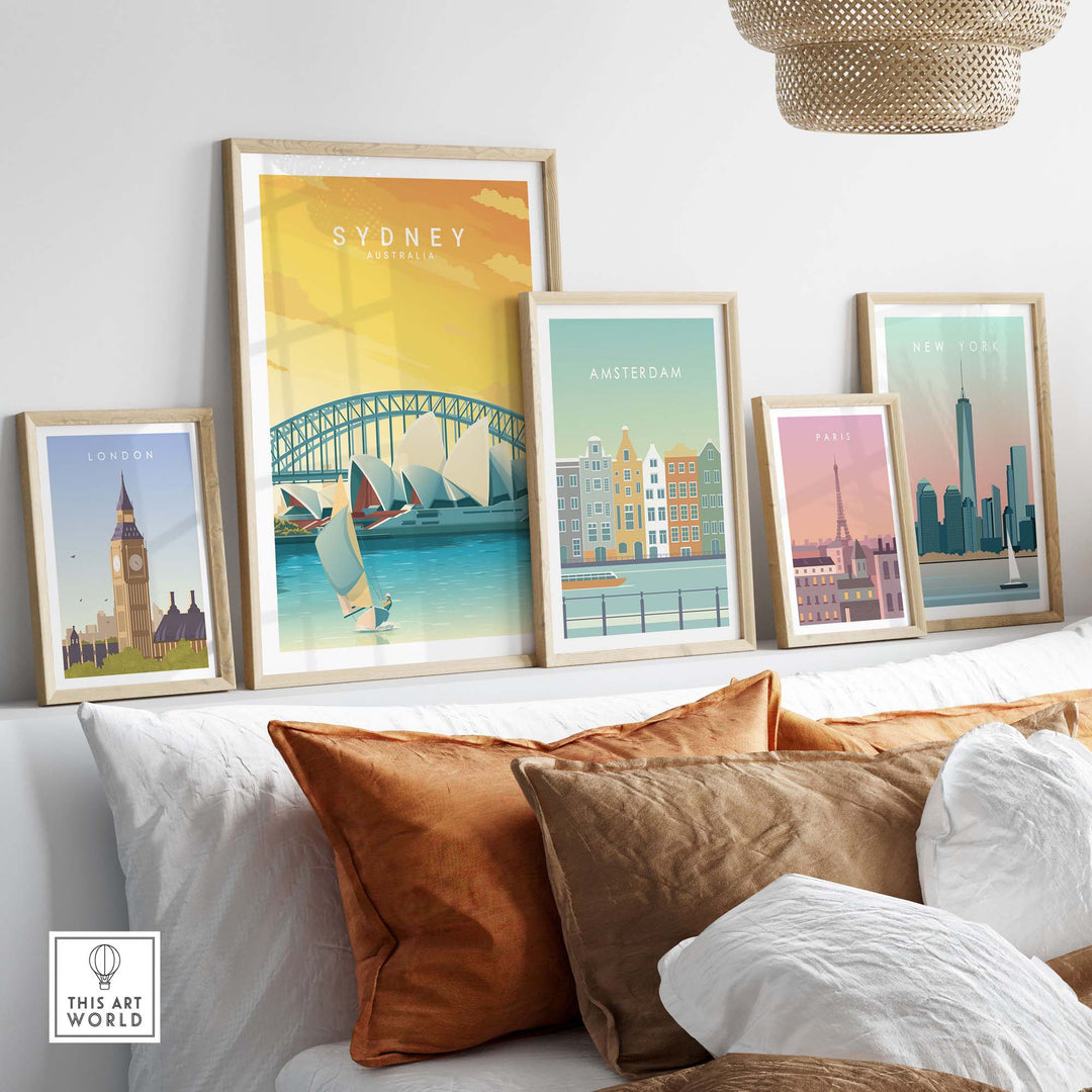 Sydney travel poster print alongside other city posters in a cozy home decor setting with stylish cushions.