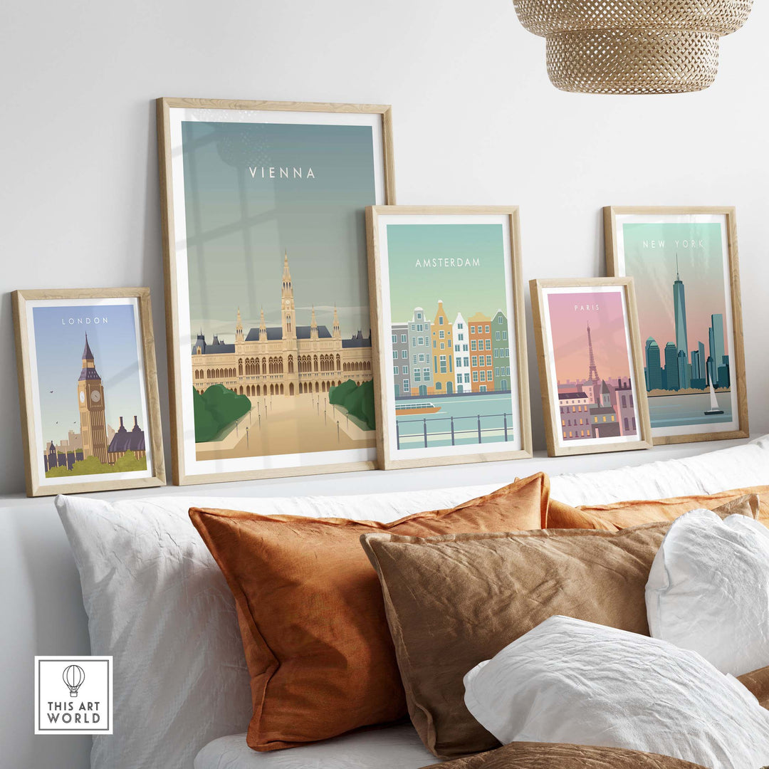Vienna Wall Art Poster showcased among framed travel posters including London, Amsterdam, and New York on a stylish sofa.