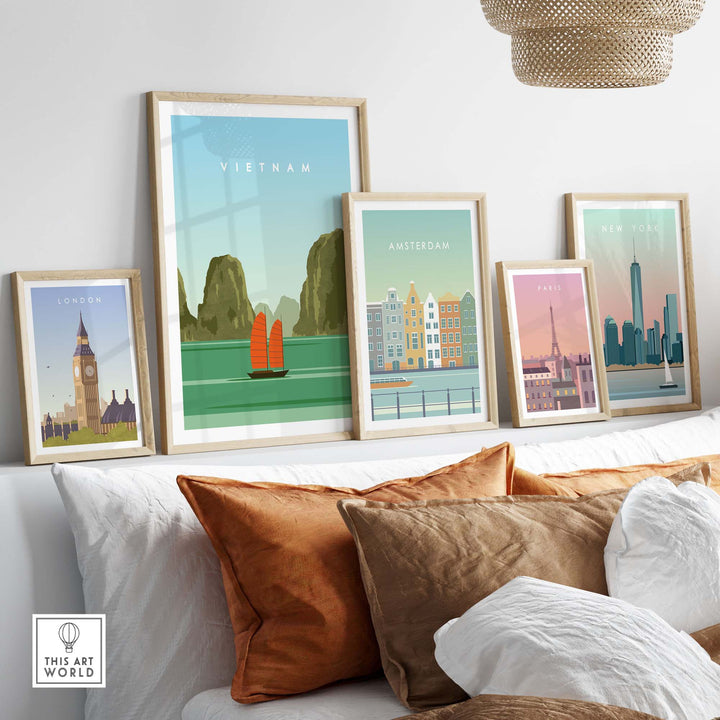 Stylish Vietnam travel poster print displayed among framed minimalist city art on a cozy sofa.