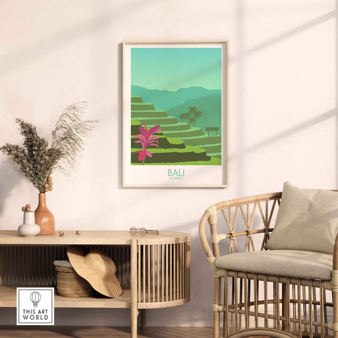 Bali wall art print featuring vintage landscape design, adorning a stylish living space with rattan furniture.