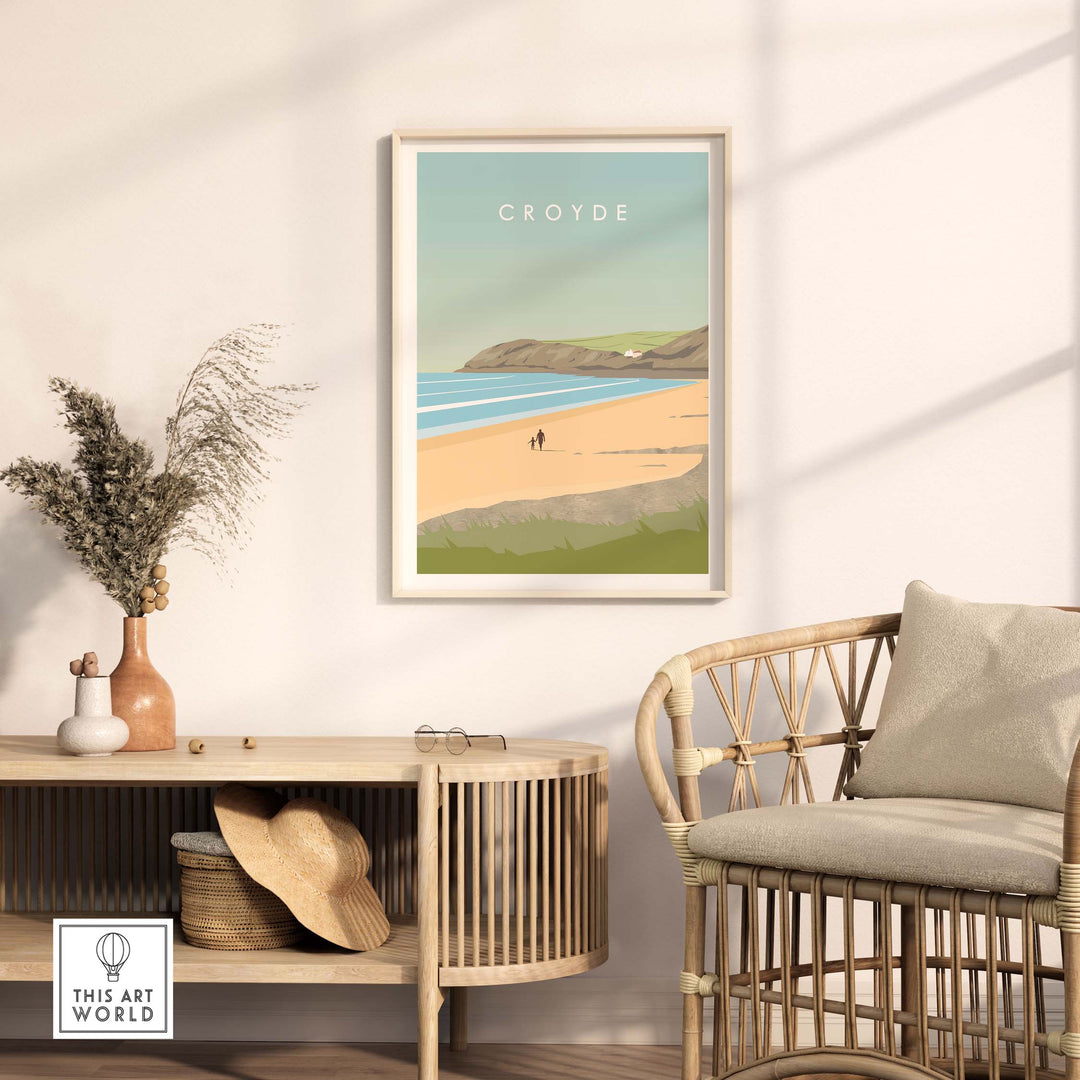 Croyde poster print wall art featuring a beach scene, framed in a stylish living room setting.