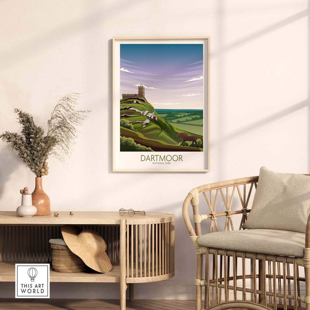 Dartmoor National Park poster displayed in a modern living room with rattan furniture and indoor plants.