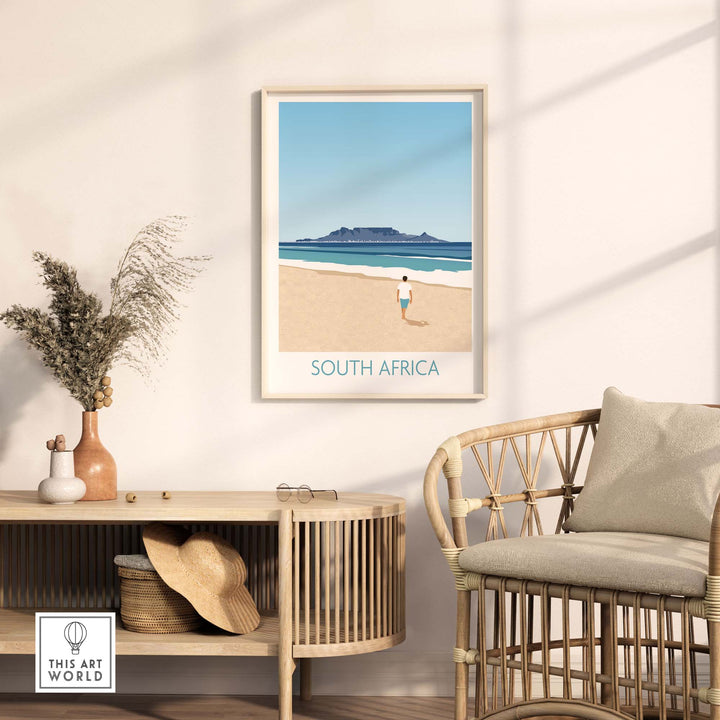 South Africa wall art print in a minimalist frame, depicting a beach scene with Table Mountain in the background.