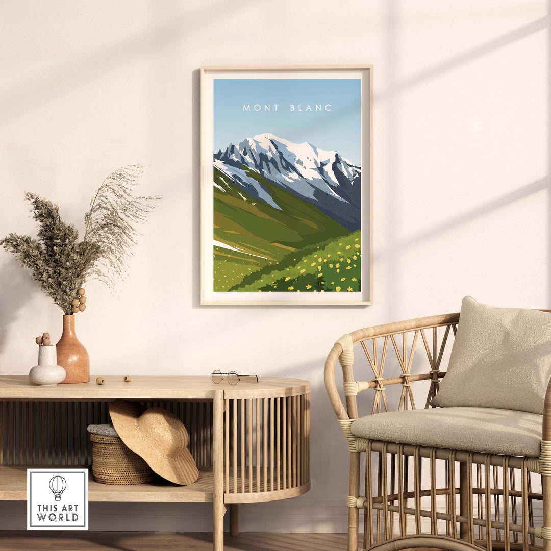 Mont Blanc travel poster print in a modern living room setting, featuring snow-capped mountains and lush green hills.