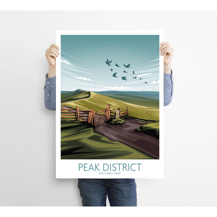 Person holding a Peak District National Park art print featuring a minimalist landscape design.