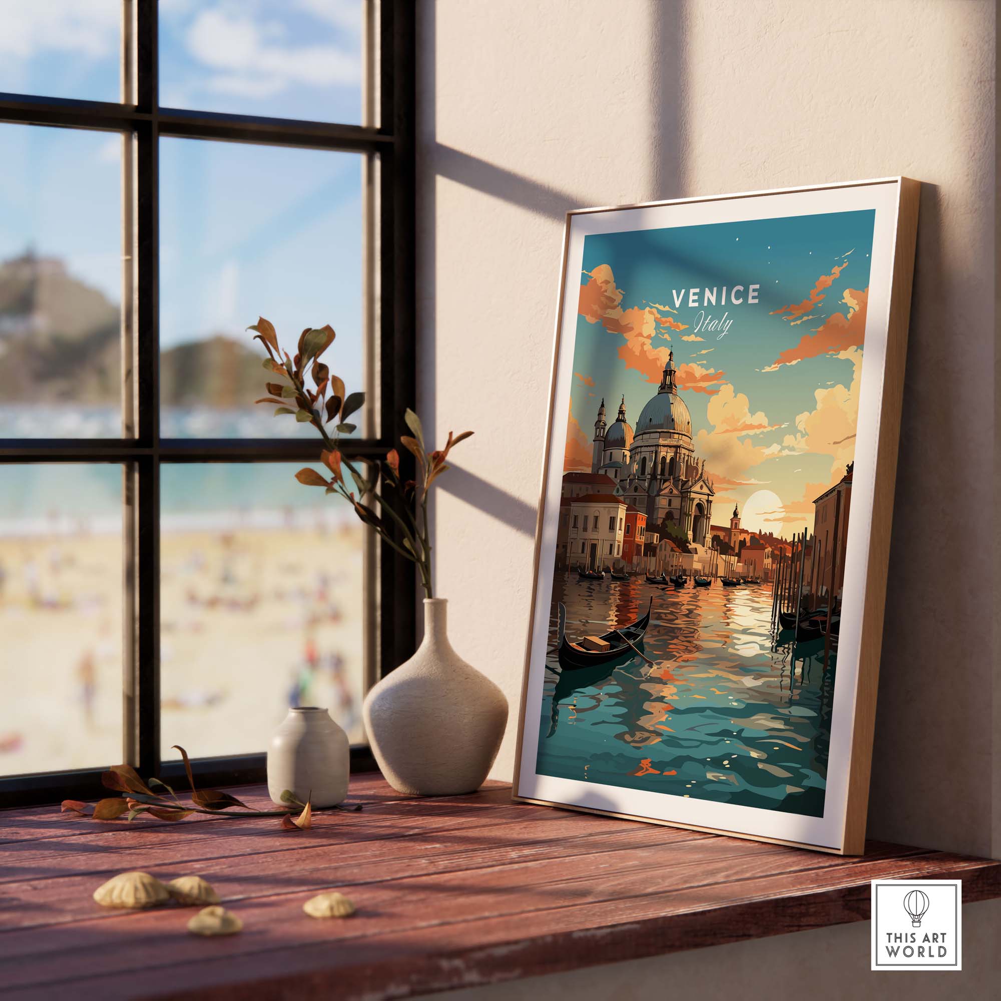 Stunning vintage travel poster of Venice canals at sunset in a framed resting on a windowsill