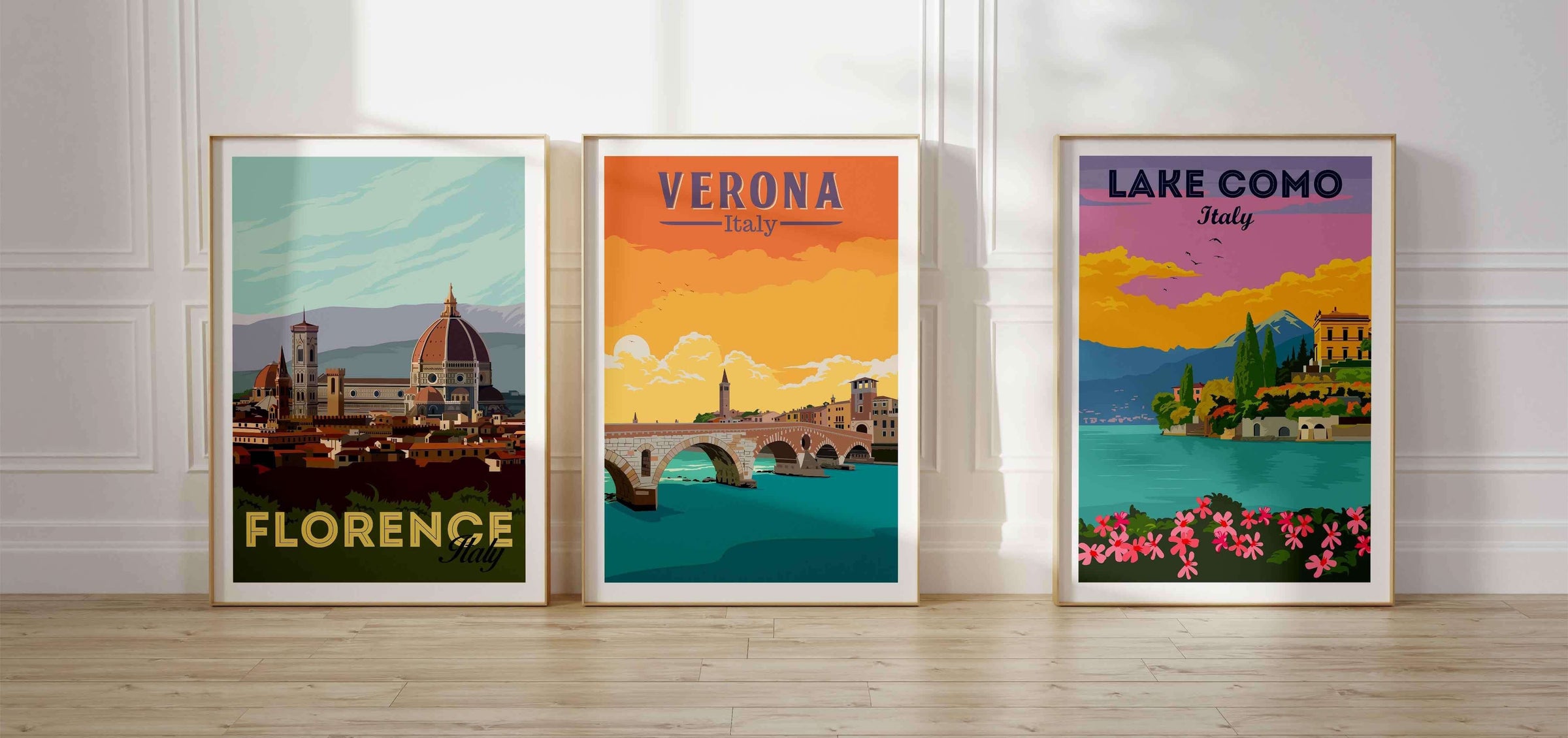 Vintage Style Travel Poster Prints - set of 3 framed travel prints on the floor featuring Florence, Verona and Lake Come