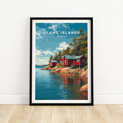 Aland Islands Finland travel poster with red cabins by the sea in a black frame