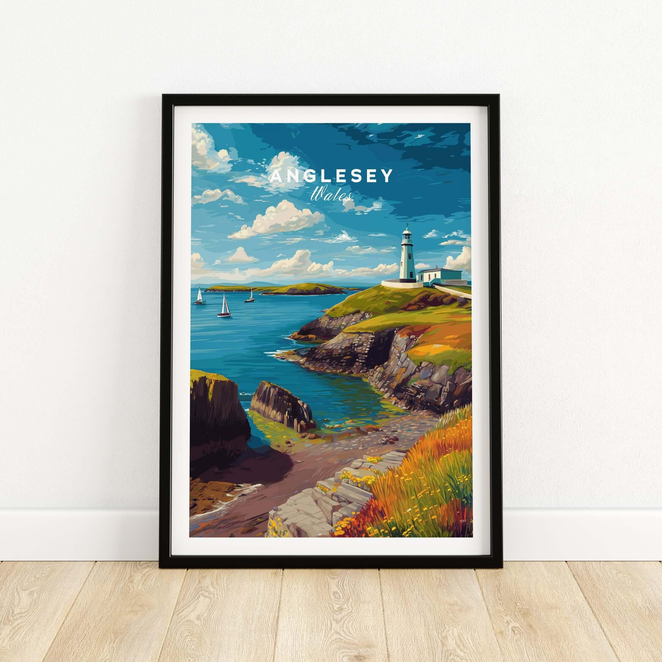 Anglesey Wales travel poster art print in black frame featuring coastal landscape and lighthouse