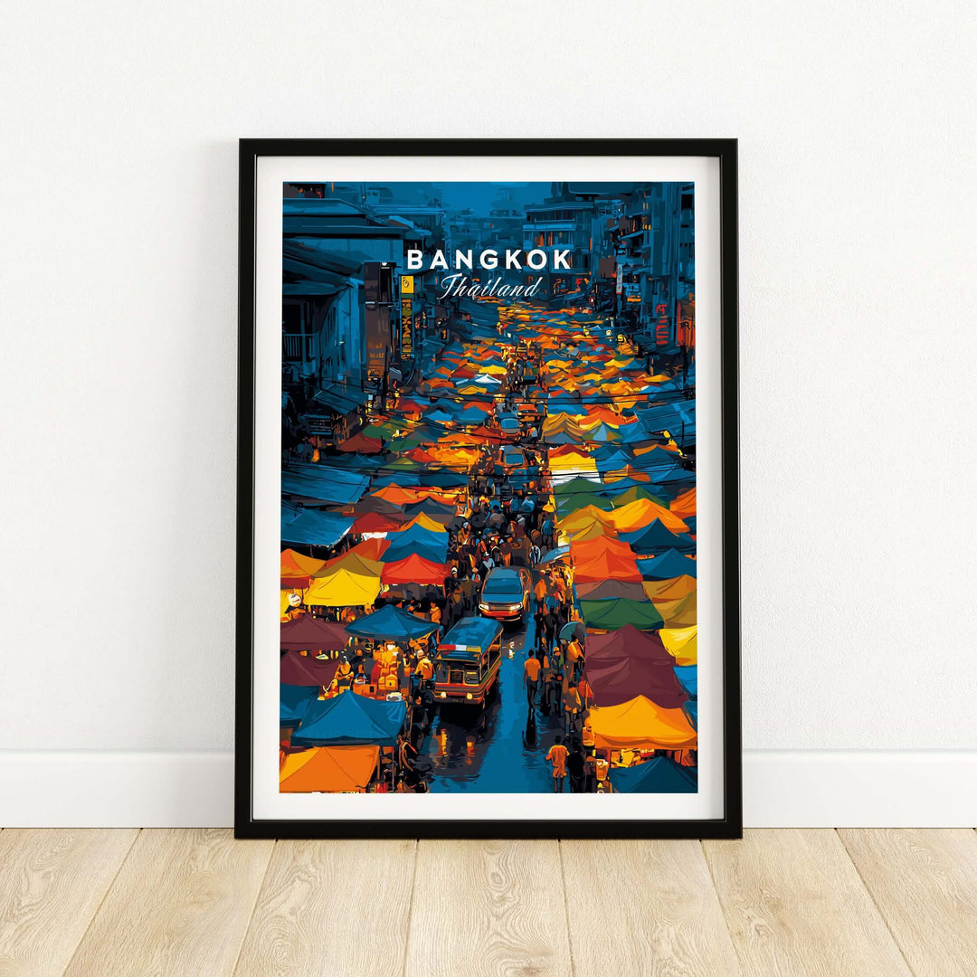 Overhead view of Bangkok's vibrant night market filled with colorful stalls and lively street activity.