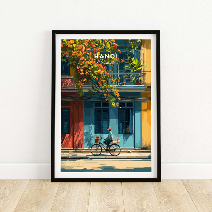 Hanoi Vietnam print featuring a cyclist on vibrant streets with colorful buildings, capturing the city's dynamic energy.