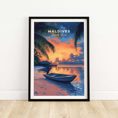 Maldives Travel Print - Sunset featuring a serene beach scene with a boat and vibrant sunset colors.