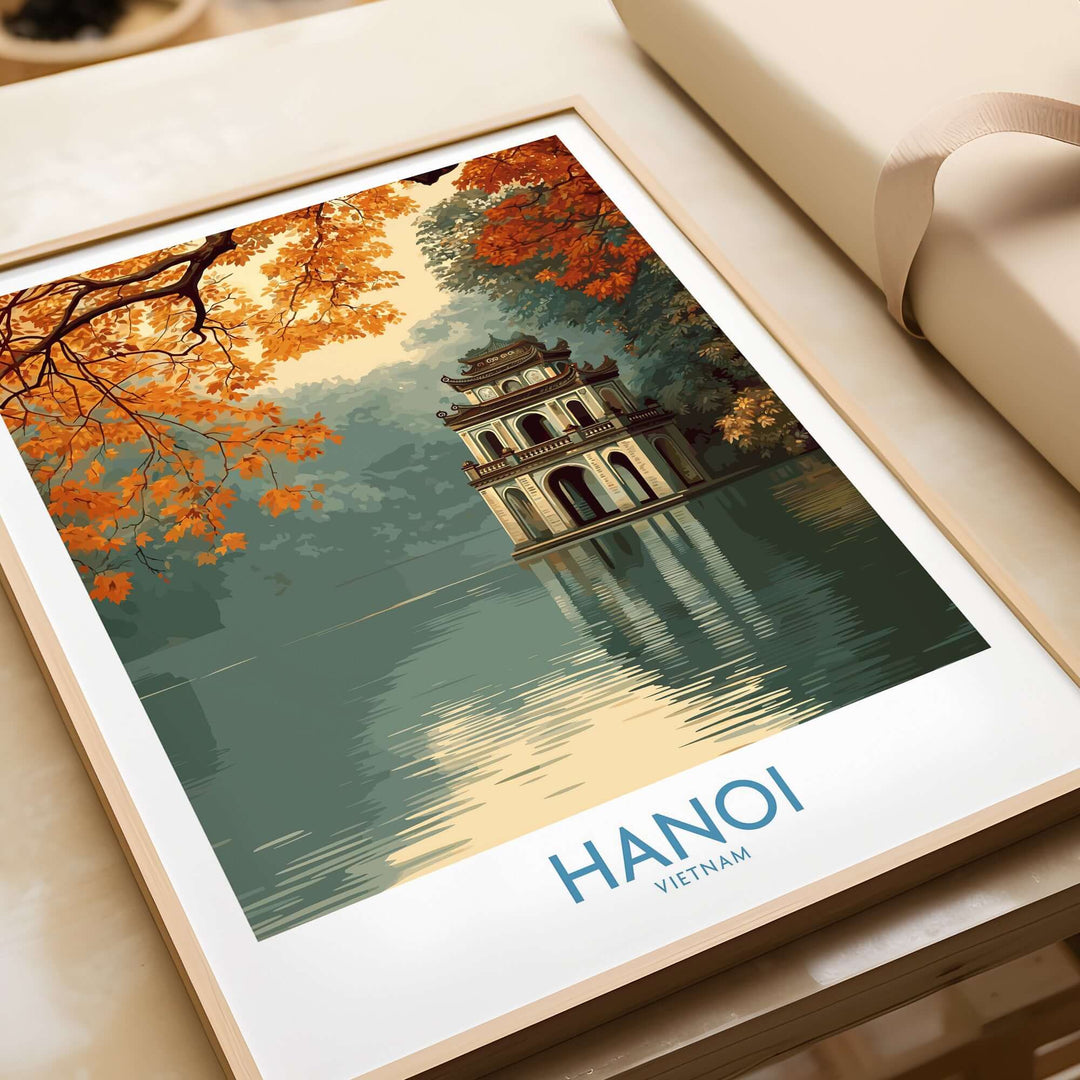 Hanoi Turtle Tower wall art print showcasing autumn colors and reflections in tranquil water, ideal for home decor.