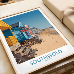 Southwold England Travel Poster featuring colorful beach huts on the sandy coastline.